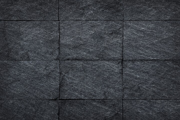 Fototapeta premium Dark slate stone wall or black stone texture abstract for background