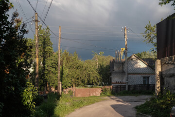 Obraz premium silhouette electric pole and sunset in the village