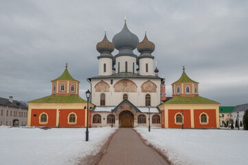 Ancient Assumption Cathedral on a gloomy March day. Tikhvin Assumption Monastery of the Theotokos. Leningrad region, Russia