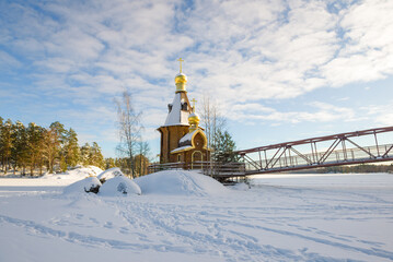 View of the Church of the Apostle Andrew the First-Called on the Vuoksa river on a sunny February day. Leningrad region, Russia