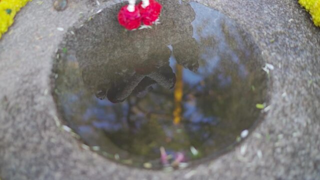 Indian god reflection in the water