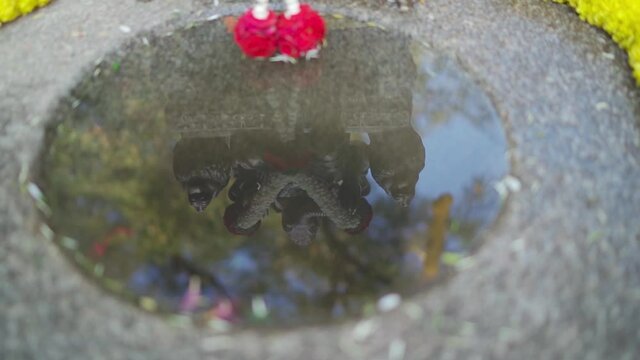 Indian god reflection in the water