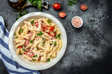 trend baked feta cheese with tomatoes and pasta for dinner. banner, menu recipe Fetapasta place for text, top view