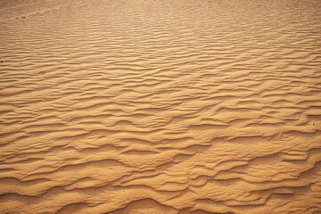 Wavy sand texture in Dubai desert close up