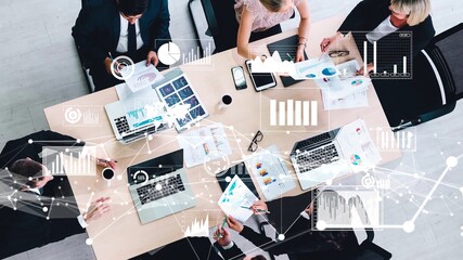 Creative visual of business people in corporate staff meeting . Concept of digital technology for marketing data analysis and investment decision making .