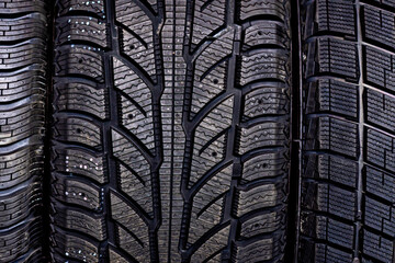 abstract background with car tire tread texture, closeup