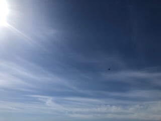 Plane in sky and clouds