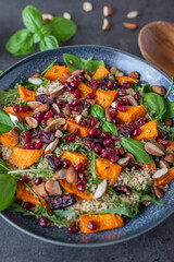 Healthy salad with couscous and sweet potato