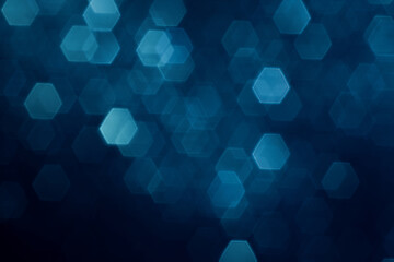 Glitter vintage lights falling down background. Silver, blue and dark defocused.