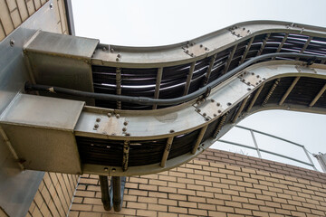 Cable tray with electrical wiring arrangement at industrial plant