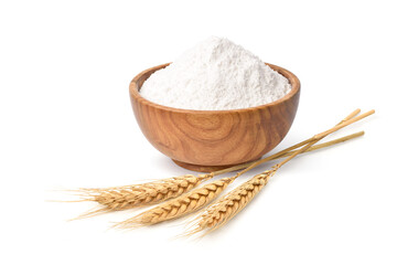 Wheat flour in wooden bowl with wheat spikelets isolated on white background.