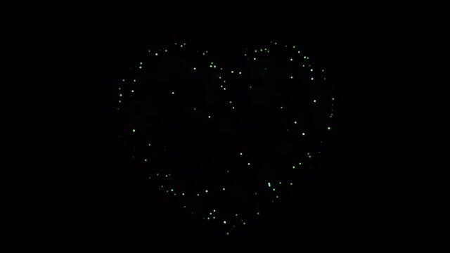 Realistic green firework heart shape on black background,