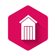 White Wooden outdoor toilet icon isolated with long shadow. Pink hexagon button. Vector