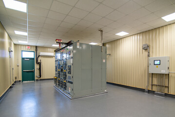 Electric voltage control room at industrial plant