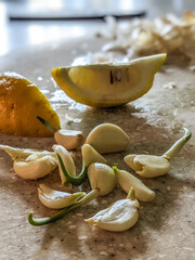 peeled and ready garlic on table ready for dinner