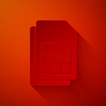 Paper cut Sim card icon isolated on red background. Mobile cellular phone sim card chip. Mobile telecommunications technology symbol. Paper art style. Vector