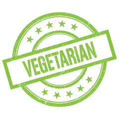 VEGETARIAN text written on green vintage stamp.