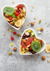Bowls with various dried fruits and nuts
