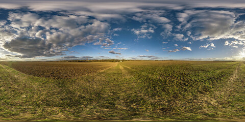 full spherical hdri panorama 360 degrees angle view on among farming fields at evening with awesome sunset clouds in equirectangular projection, ready for VR AR virtual reality content