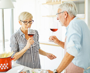 love kitchen senior glass woman couple home retirement happy food smiling husband wine together portrait