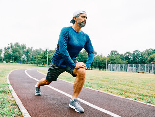 senior man running exercising sport fitness active fit