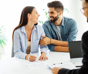 young couple shaking hands deal contract real estate investment business office agreement agent