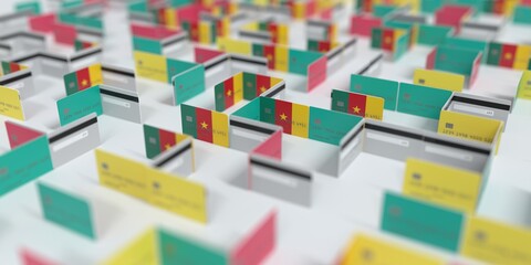 Flag of Cameroon on the mockup credit card maze. Financial difficulties related 3D rendering