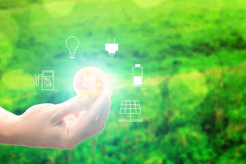ecology, environment, recycling concept, hand holding the earth lamp with renewable energy resource icons,Elements of this image furnished by NASA