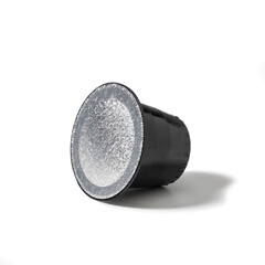 Espresso Coffee Pod, Isolated on White Background – Black Coffee Capsule, Single Serve for Espresso Machine, Italian Coffee – Detailed Close-Up Macro, High Resolution