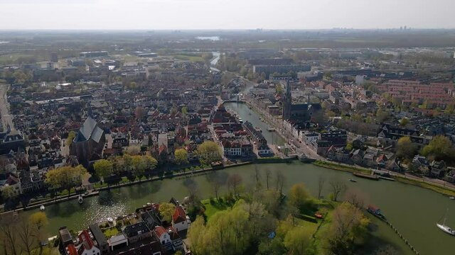 Weesp small city in North holland, The Netherlands, city view along the water aerial drone footage.