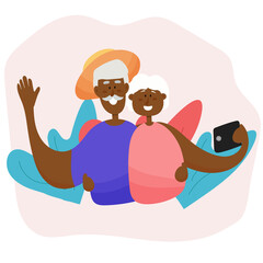 A black elderly couple takes a selfie while traveling. Active grandparents travel together.