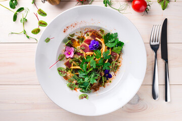 Lightly seared tuna steak with sesame and fresh salad
