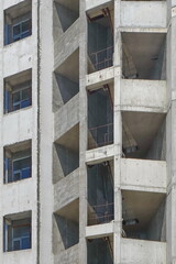 Unfinished Construction Of Monolithic House.  Construction Of Monolithic Multistory Building. Site Work From Concrete Apartments Building Framework.