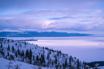 Cloudy weather conditions in the Arctic region, natural scenery along the Arctic Ocean. Winter nature background picture.