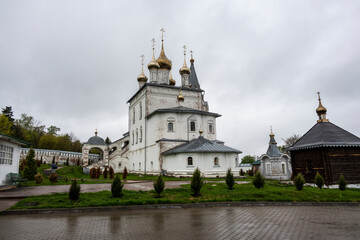 Fototapeta na wymiar cityscape of the old center of Gorokhovets with churches, temples and houses in the rain