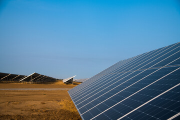 Blue solar panels with the sunny sky