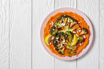 grilled broccoli steaks with puree and feta
