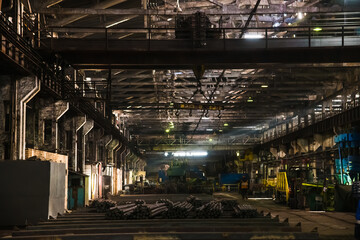 Metal structures and buildings of the old metallurgical plant inside and outside. Products of the metallurgical enterprise.