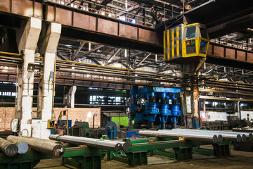 Metal structures and buildings of the old metallurgical plant inside and outside. Products of the metallurgical enterprise.