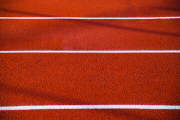 Red running sport track background and texture