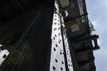 the iron elevated track of the hamburger ubahn line U3 in the port of hamburg in bright sunshine