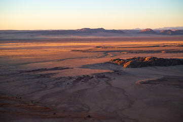 In the arid area of the world, the scenery of the Taklimakan Desert in Xinjiang, China, with a detailed background image of the desert Gobi.