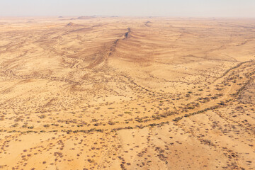In the arid area of the world, the scenery of the Taklimakan Desert in Xinjiang, China, with a detailed background image of the desert Gobi.