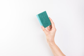 Sponge for washing dishes in female hand. Woman's hand gesture or sign isolated on white. A hand holds a sponge for washing and cleaning dishes