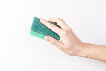 Sponge for washing dishes in female hand. Woman's hand gesture or sign isolated on white. A hand holds a sponge for washing and cleaning dishes