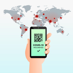 Mobile phone screen and vaccination pass with QR code. Hand holding smartphone in hand and showing vaccinated sign on display. COVID-19, coronavirus, world map, global pandemic and vaccine concept.