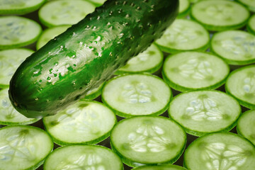 Fresh sliced cucumber and cucumber close-up. Fresh organic vegetables