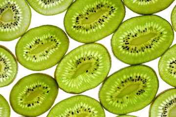 Sliced kiwi slices isolated on white background, top view. Fresh fruit kiwi sliced use for...