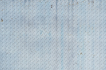 Abstract white blue metal background. Iron texture on outdoor metal wall.
