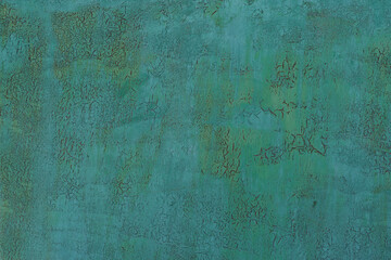 Painted in green old cracked metal rusted background. Metal texture. Erosion metal. Scratched and...
